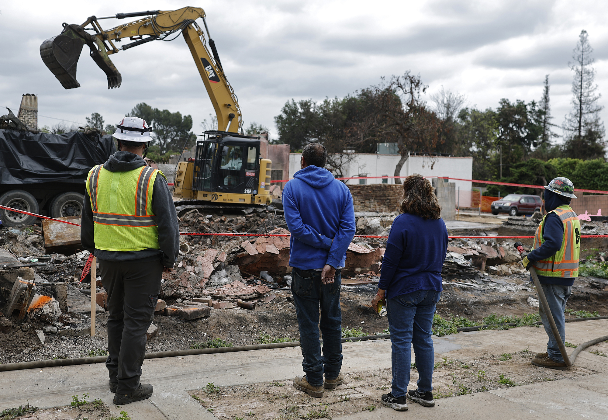 Their town burned to the ground. Should they get a pass from California’s new housing laws?